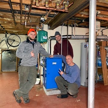 Seaside Gas Crew Working In A Basement