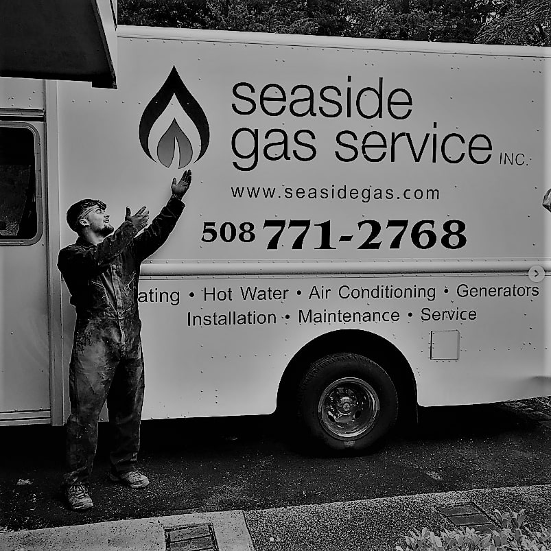 Seaside Gas Technician Next To A Service Van